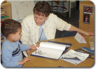 adult and child in classroom